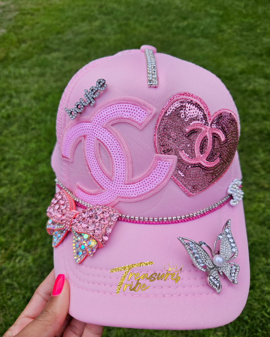 Cha*el Butterfly Hat with grass background front side