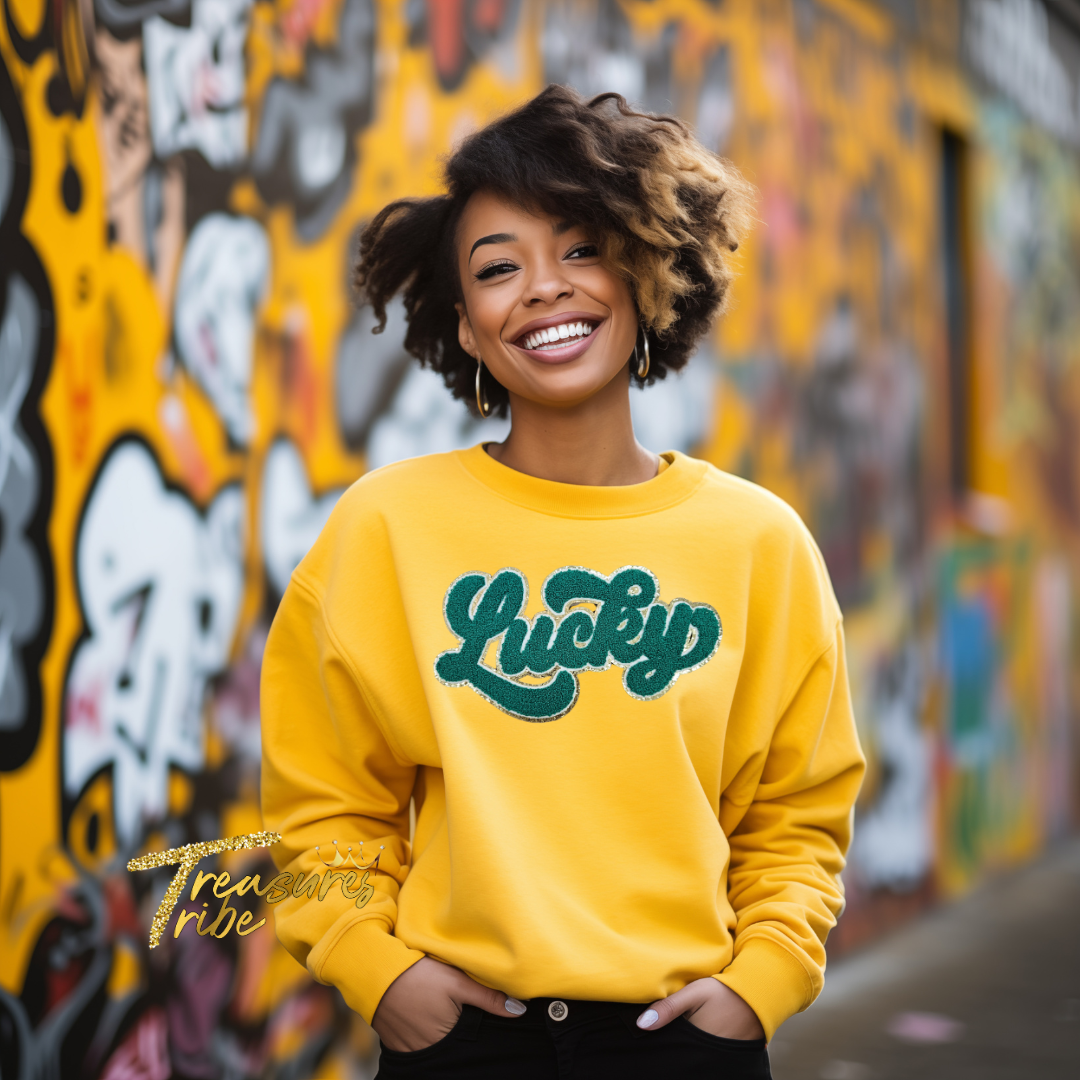 Lucky Green on a yellow sweatshirt front side