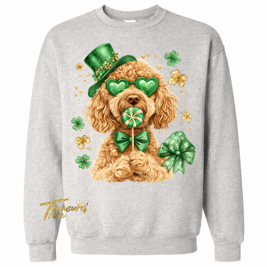 Gray sweatshirt with a dog wearing a green hat and holding a shamrock, on a white background.